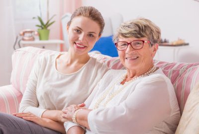 elderly woman and caregiver